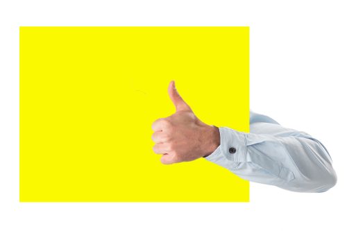 Thumbs up on a yellow sheet